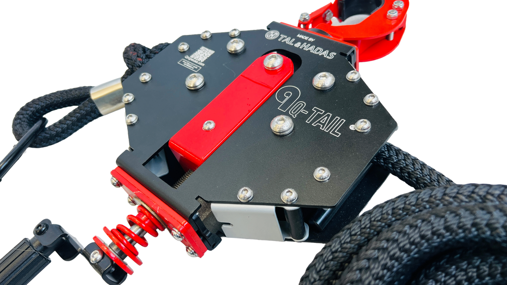 Close up of the Q-Tail body showing the red center bar on the bolted black plate