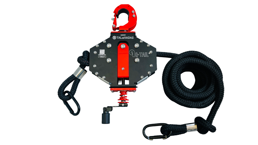 Q-Tail trainer with its red hook and coiled black rope